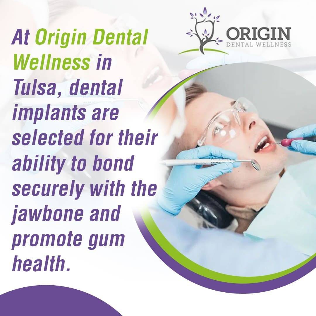 A male patient in a dental chair is examined by a dentist, with text explaining that Origin Dental Wellness in Tulsa selects dental implants for secure bonding and gum health.