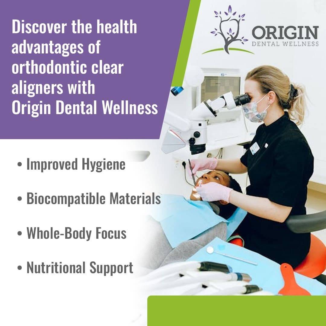 A dentist working on a patient while looking through a dental microscope.